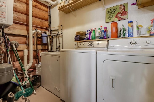 washroom featuring washer and dryer