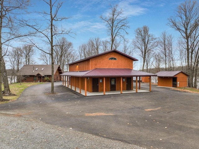 view of front facade with an outbuilding