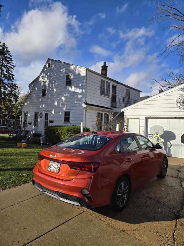 view of property exterior with a garage