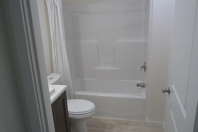 S13041 Shifflet Rd Unit 128, Spring Green, WI 53588 - bathroom with vanity, toilet, shower / tub combo, and wood finished floors