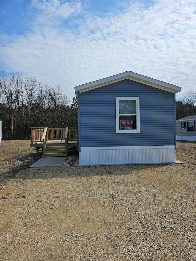 S13041 Shifflet Rd Unit 128, Spring Green, WI 53588 - view of property exterior featuring a deck
