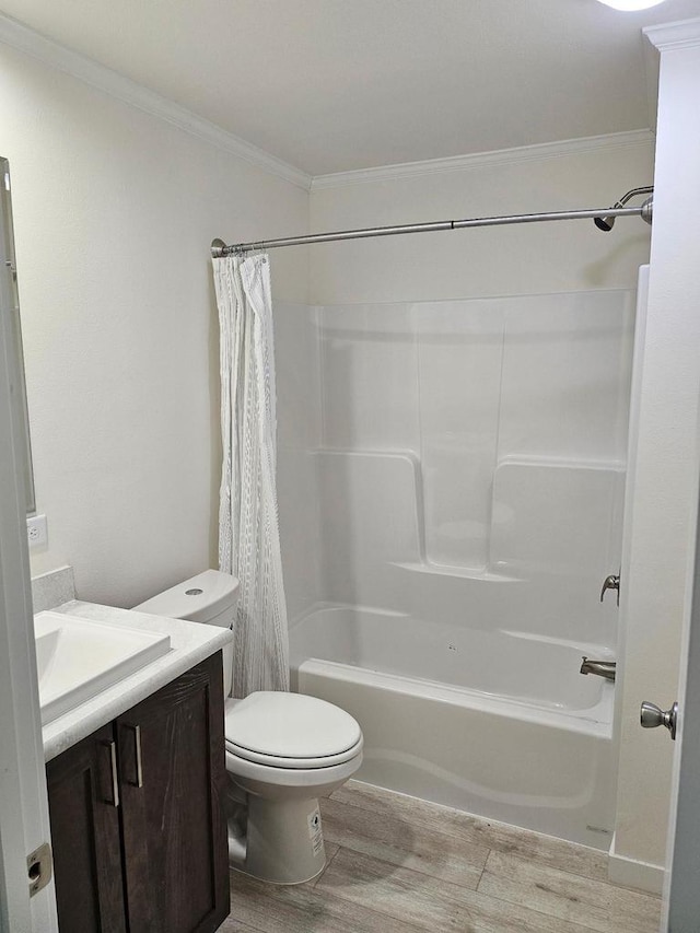 S13041 Shifflet Rd Unit 128, Spring Green, WI 53588 - bathroom with crown molding, shower / tub combo, wood finished floors, vanity, and toilet