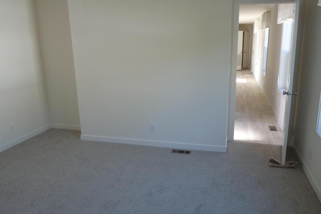 S13041 Shifflet Rd Unit 128, Spring Green, WI 53588 - empty room with light carpet and baseboards