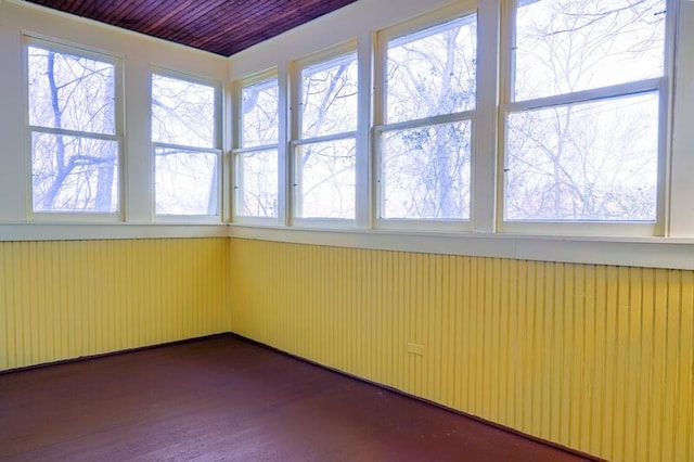 unfurnished sunroom with a healthy amount of sunlight