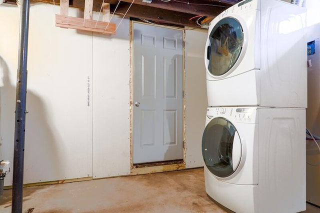 washroom with stacked washer and clothes dryer