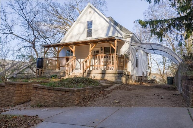 view of front of property featuring covered porch