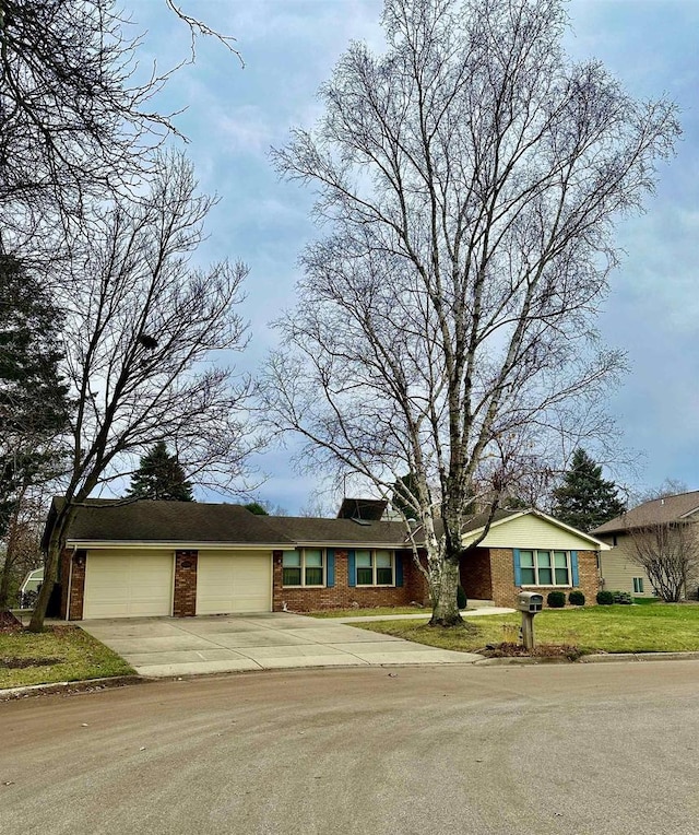 single story home with a garage