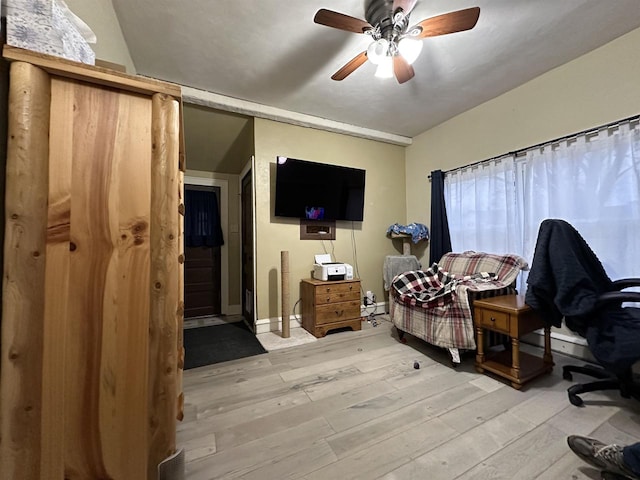 bedroom with ceiling fan and light hardwood / wood-style flooring