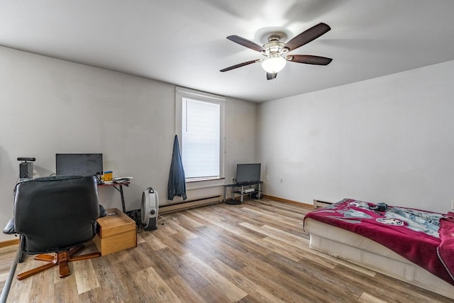 office area featuring ceiling fan and hardwood / wood-style flooring