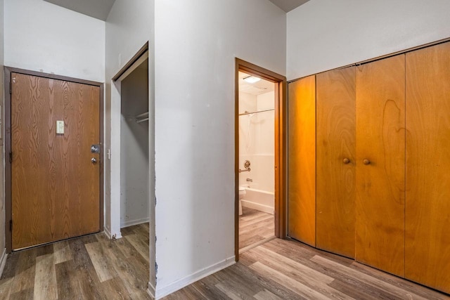 foyer entrance with hardwood / wood-style floors