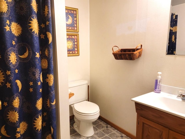 bathroom with tile patterned floors, vanity, toilet, and a shower with curtain