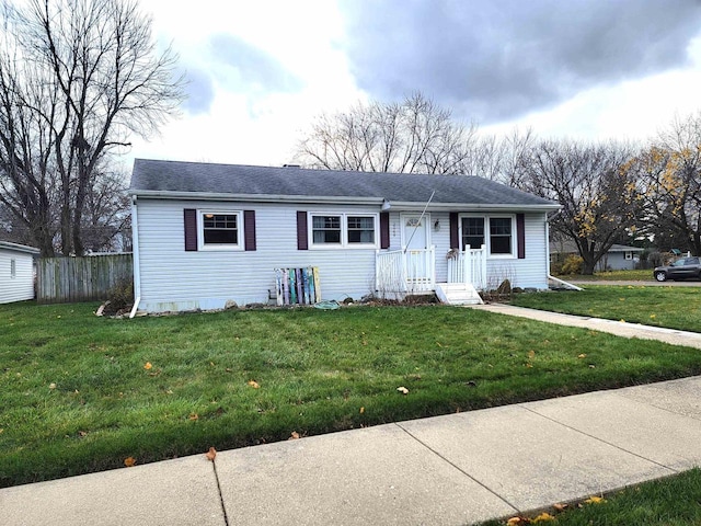 ranch-style home with a front lawn