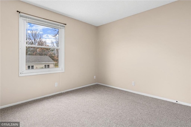 empty room with carpet floors