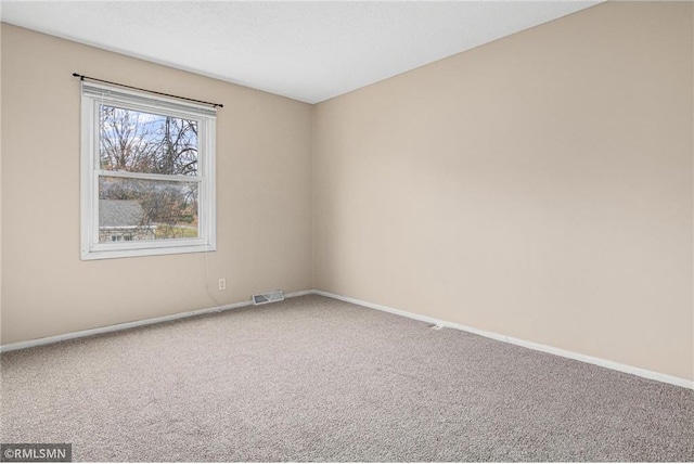 view of carpeted spare room