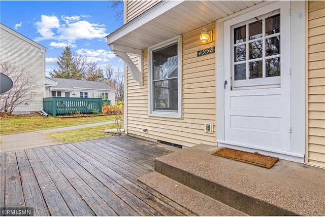 doorway to property with a deck