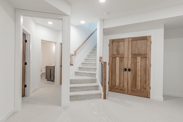 stairs with carpet floors