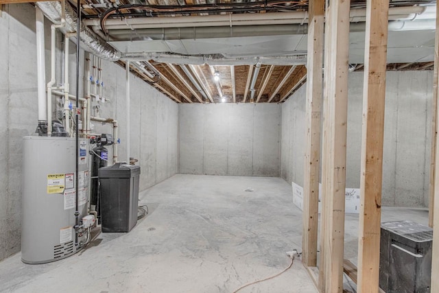 basement featuring gas water heater