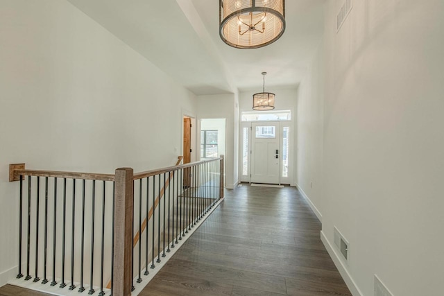 interior space with dark hardwood / wood-style flooring