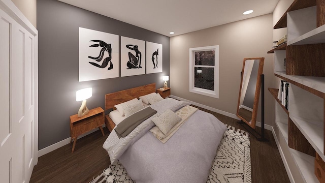 bedroom with dark hardwood / wood-style floors