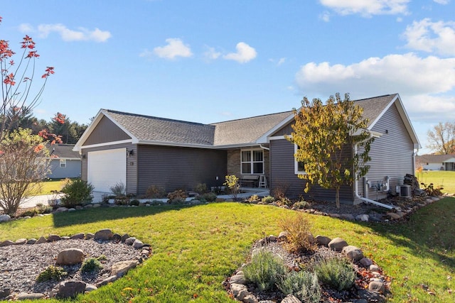 single story home featuring a front yard, central AC, and a garage