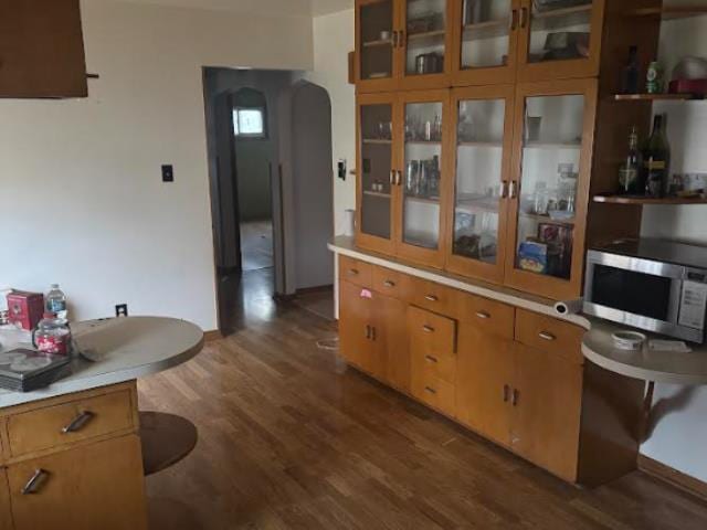 kitchen featuring dark hardwood / wood-style flooring