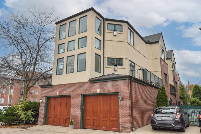 view of building exterior featuring a garage