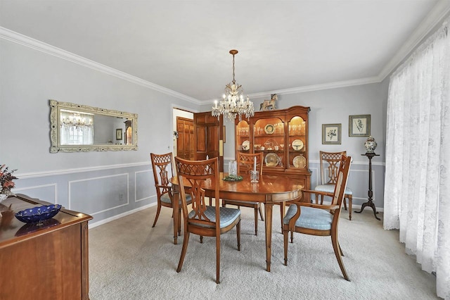 carpeted dining room featuring crown molding and a notable chandelier