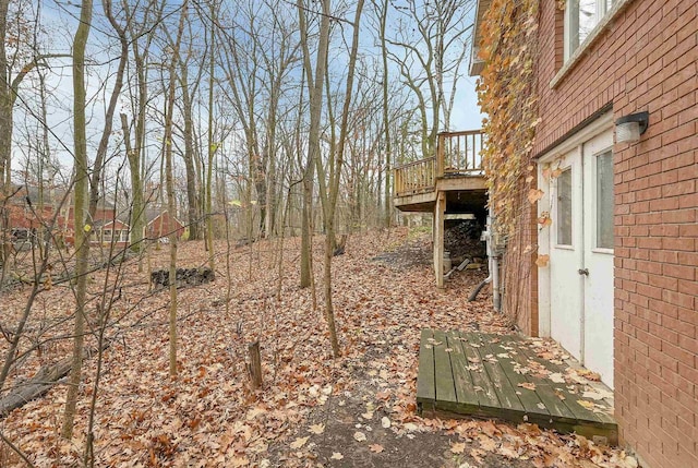 view of yard featuring a deck