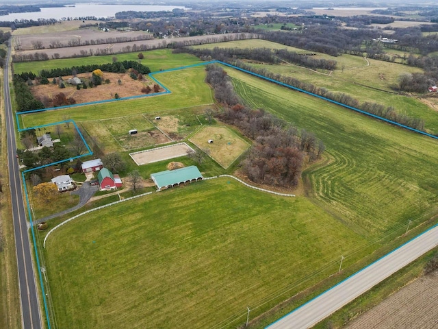 birds eye view of property featuring a rural view