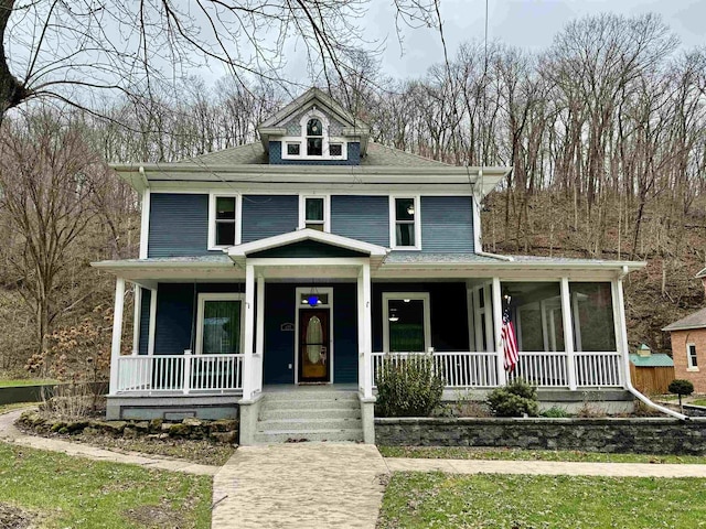 view of front of home featuring covered porch