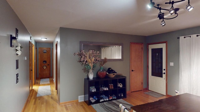 hall featuring light hardwood / wood-style floors