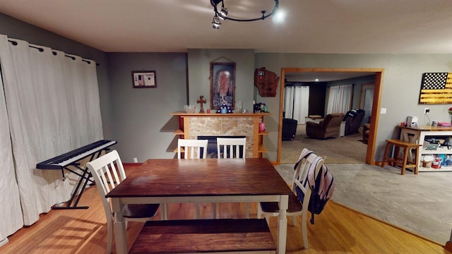 dining area featuring light wood-type flooring