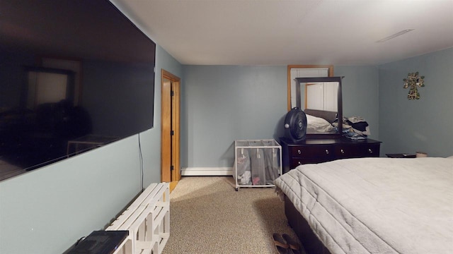 bedroom featuring a baseboard radiator and light colored carpet