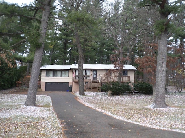 view of front of property featuring a garage