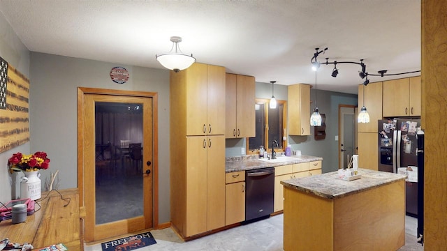 kitchen featuring sink, a center island, hanging light fixtures, light brown cabinets, and dishwasher