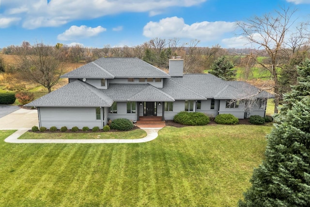 view of front of property with a front lawn