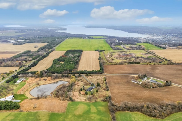 bird's eye view with a rural view and a water view