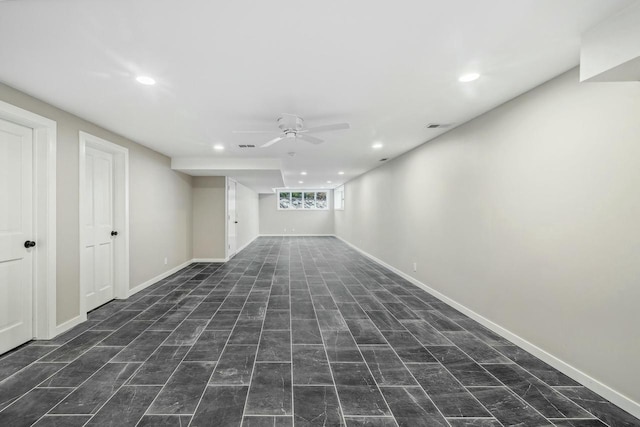 basement with ceiling fan