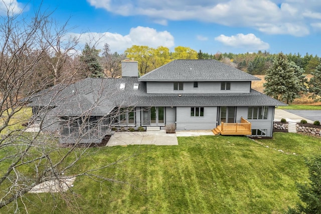 back of house with a patio, a deck, and a lawn