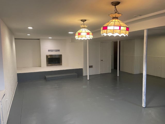 basement featuring a large fireplace