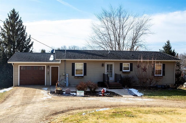 single story home with a garage