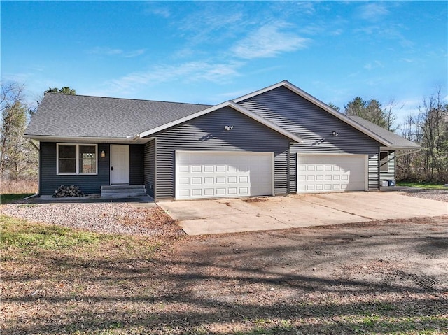 ranch-style home featuring a garage