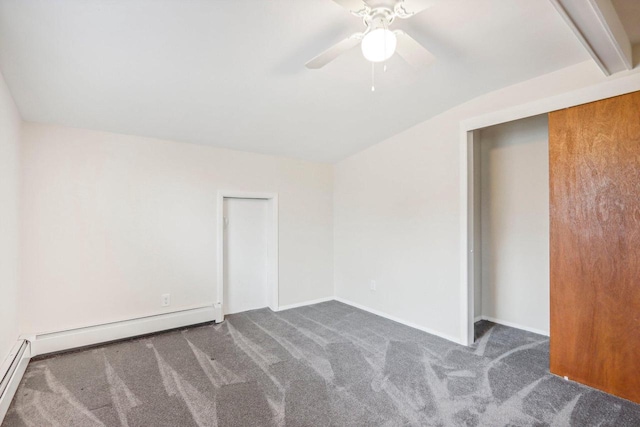 carpeted spare room featuring lofted ceiling with beams, ceiling fan, and a baseboard radiator