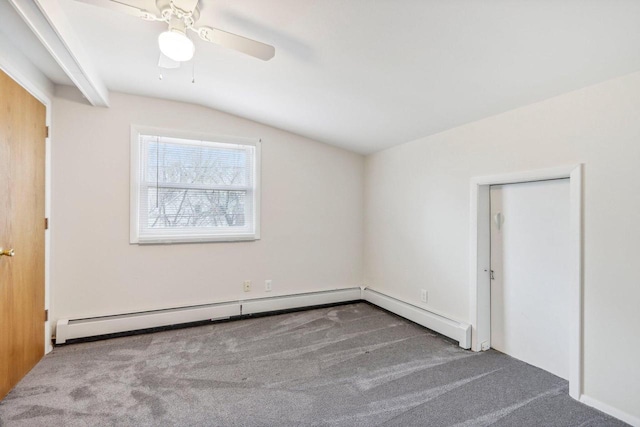 interior space with ceiling fan, carpet, and lofted ceiling