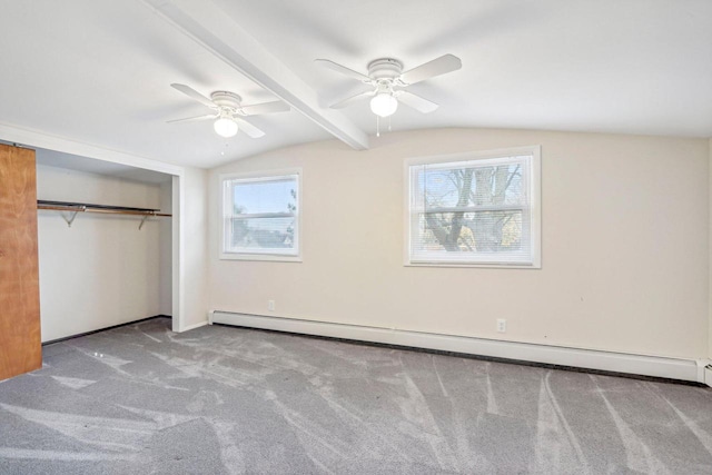 unfurnished bedroom featuring ceiling fan, light colored carpet, lofted ceiling with beams, and a baseboard heating unit