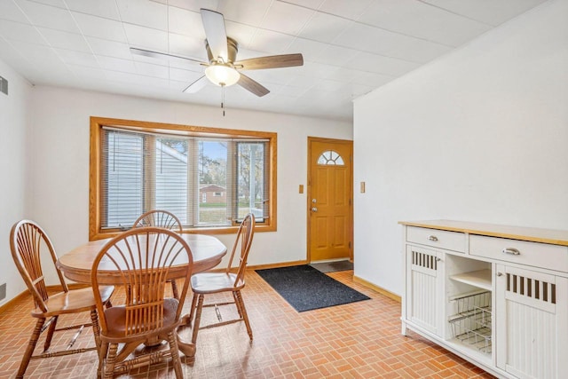 dining area featuring ceiling fan