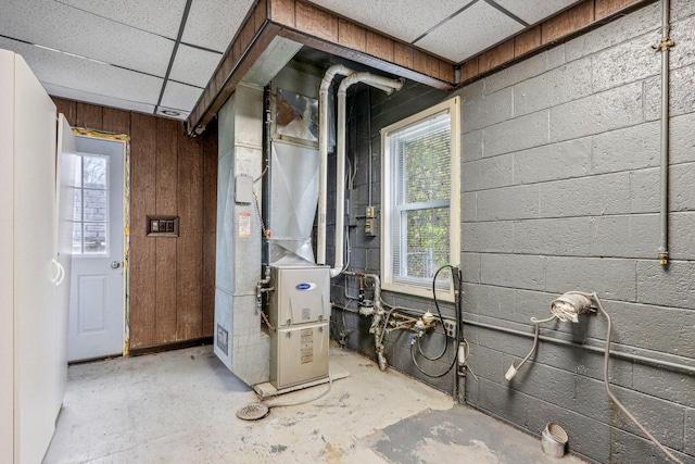 utility room with heating unit