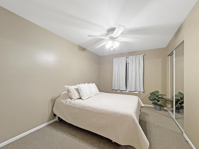 bedroom featuring a closet, ceiling fan, and carpet flooring