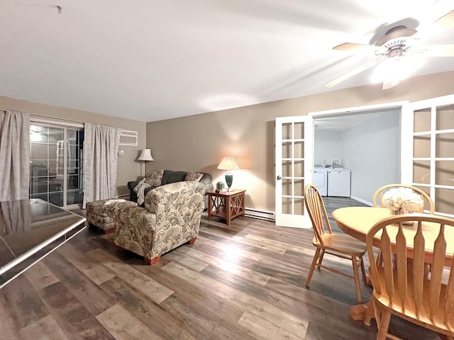 living room with ceiling fan, dark hardwood / wood-style floors, separate washer and dryer, a baseboard radiator, and french doors