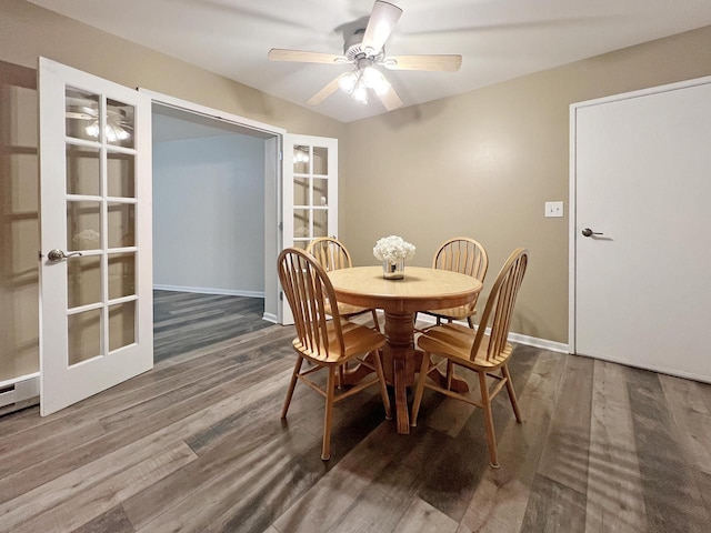 dining room featuring french doors, ceiling fan, and hardwood / wood-style floors